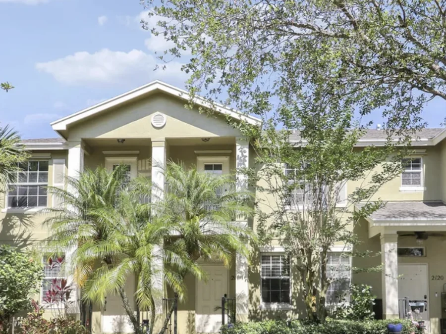 Exterior of the East Lake Village townhome at 2122 SE Grand Drive in Port St. Lucie, Florida